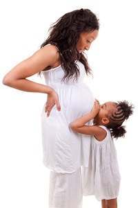 shutterstock_pregnant-woman-and-child